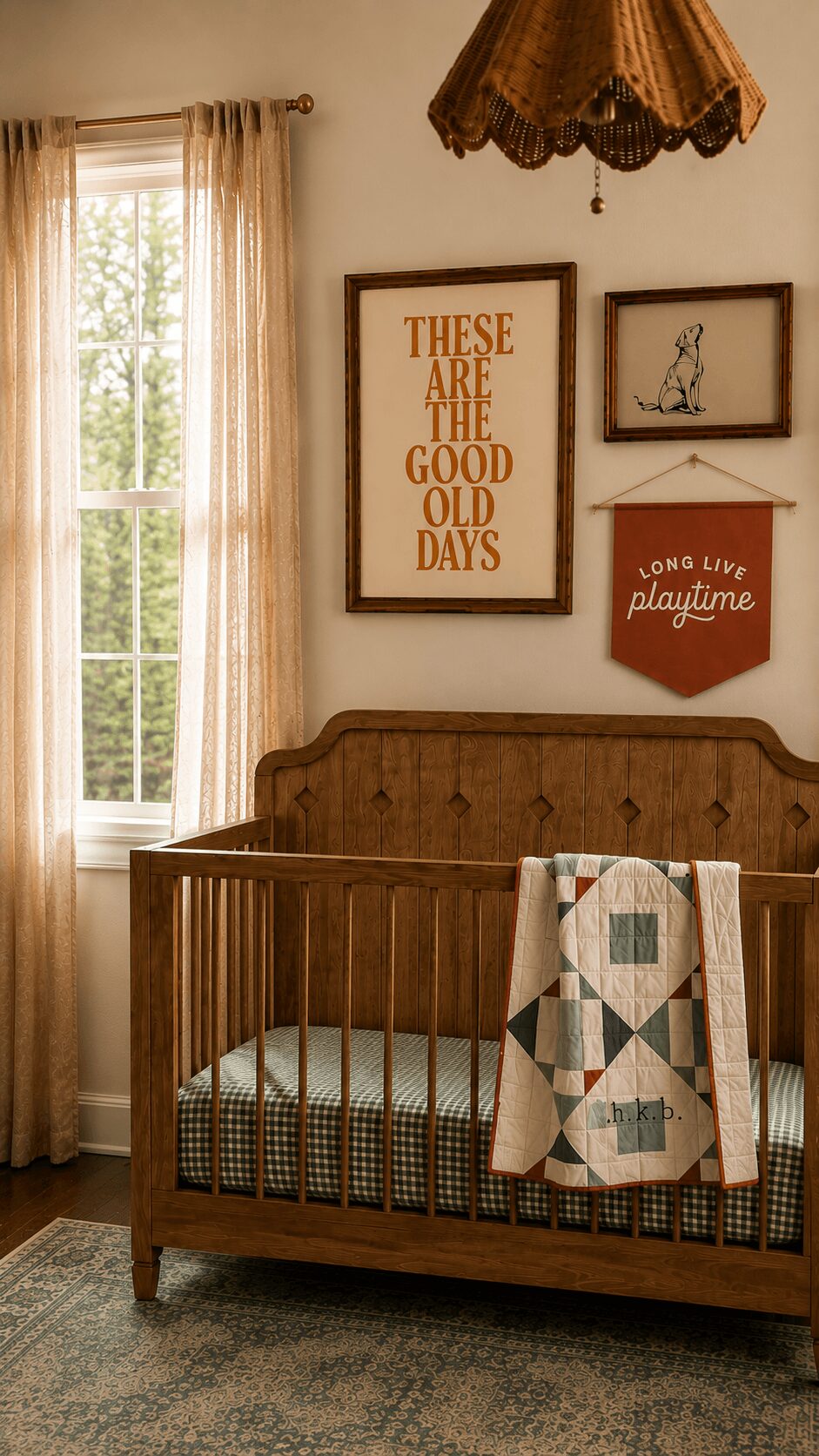 Wooden crib with a quilt draped over the side, window with curtains, and framed wall art in a cozy room.