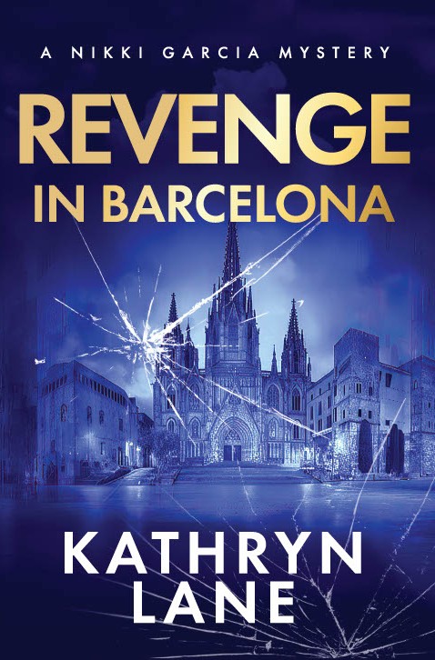 Book cover with a cityscape of Barcelona, featuring a cathedral and fireworks, titled 'Revenge in Barcelona' by Kathryn Lane.