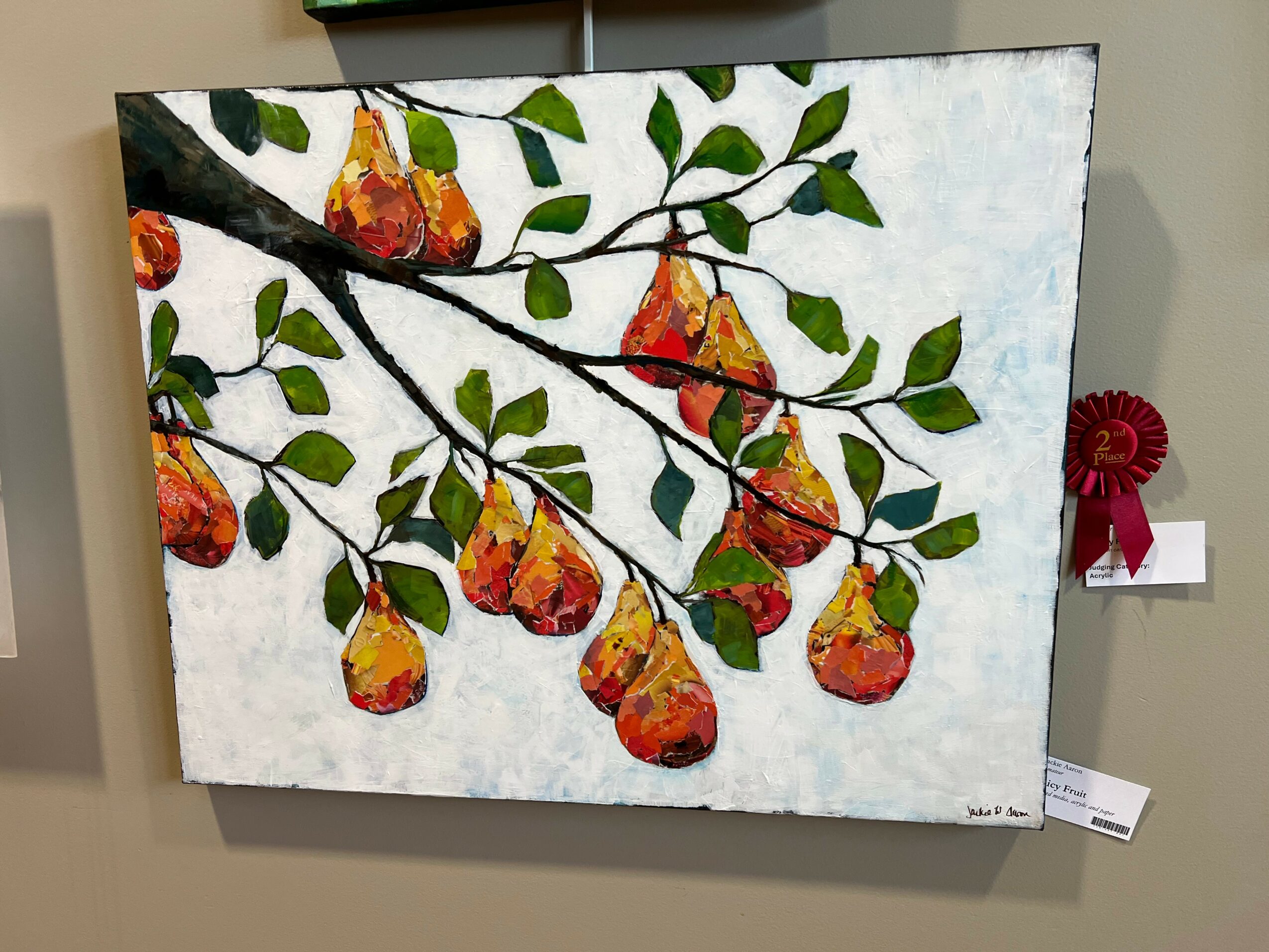 Painting of a branch with green leaves and hanging pears, on a white background.