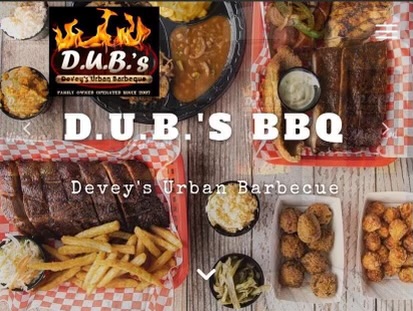 Barbecue food with fries, sides, and a logo for DUB'S BBQ on a checkered tablecloth.