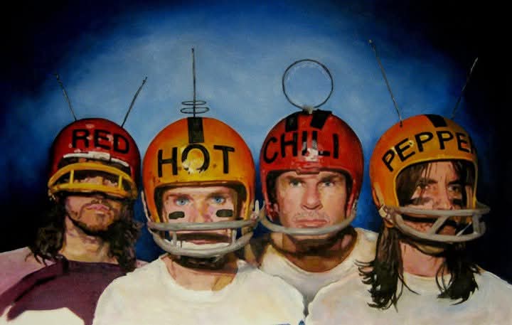 Four people wear football helmets with humorous labels, standing against a blue background.